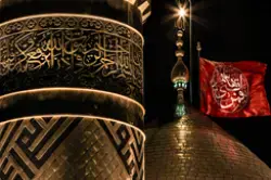 صورة جميلة للقبة الذهبية ومئذنة أبي الفضل العباس ليلا